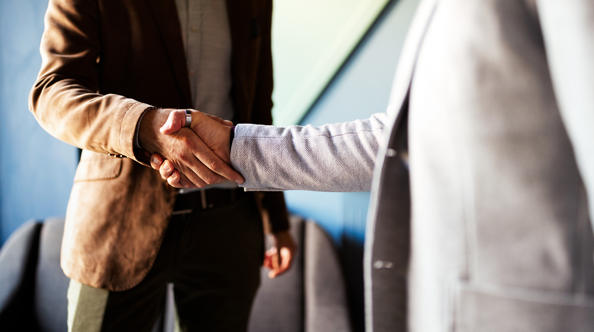Two members shaking hands